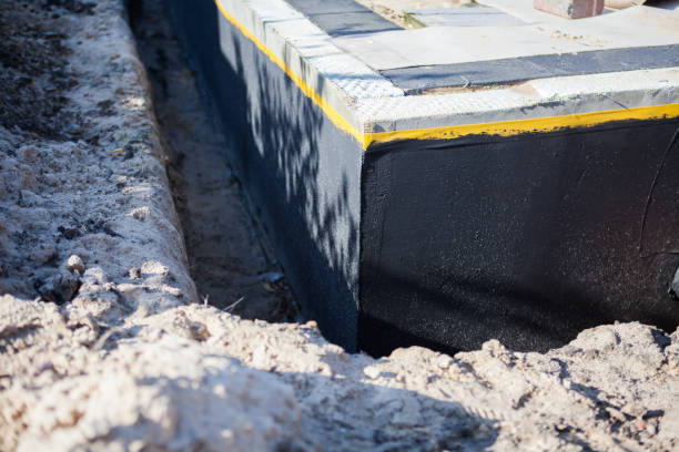 Professional Waterproofing technician working in Chelsea, AL